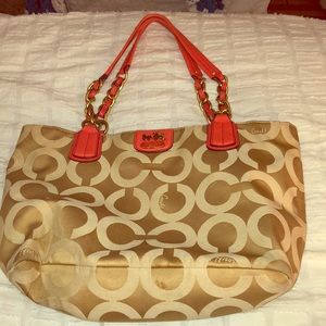 Coach purse with orange straps